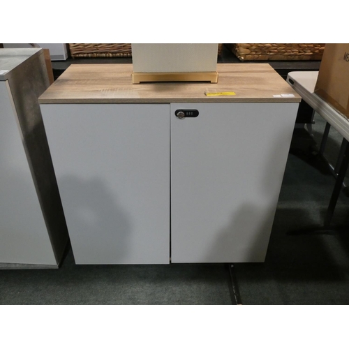 3184 - A wood/white two door storage cabinet * this lot is subject to VAT