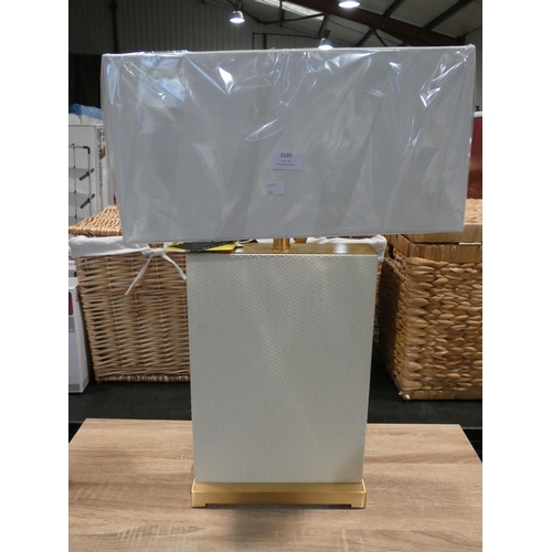 3185 - A cream/gold table lamp * this lot is subject to VAT