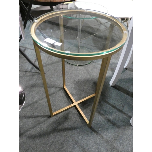 3191 - A circular glass/gold metal side table * this lot is subject to VAT