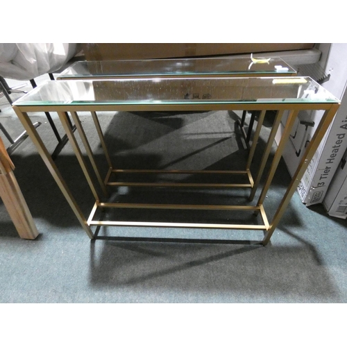 3194 - A glass/gold metal framed console table * this lot is subject to VAT