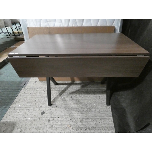 3217 - A darkwood drop-leaf dining table * this lot is subject to VAT