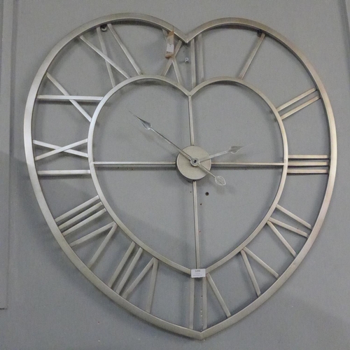 1496 - A silver heart skeleton wall clock (1785728)   #