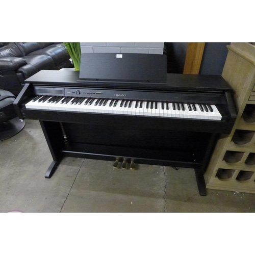 1514 - A Casio digital cabinet style piano (4043-39) - RRP £541.66 + VAT * this lot is subject to VAT - mis... 