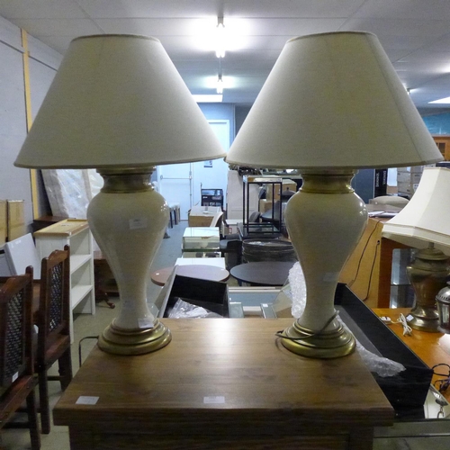 1883 - A pair of cream ceramic table lamps