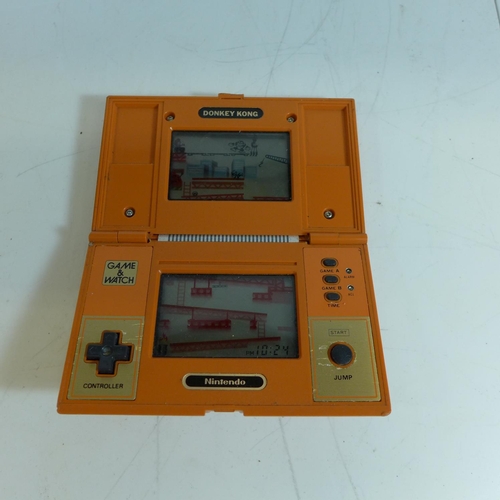 2152 - Vintage Nintendo Donkey Kong multi screen handheld video game - W