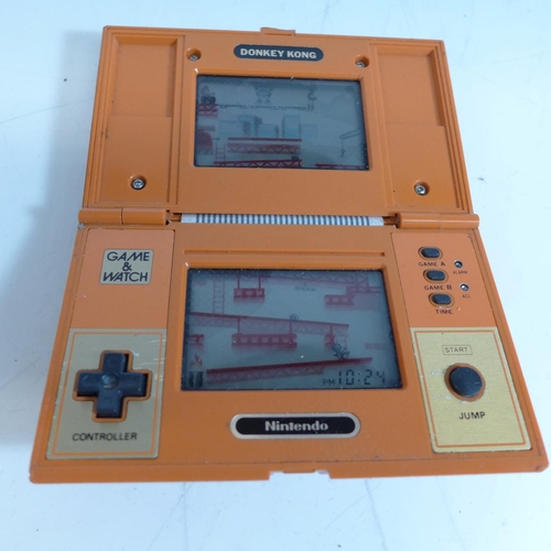 2152 - Vintage Nintendo Donkey Kong multi screen handheld video game - W