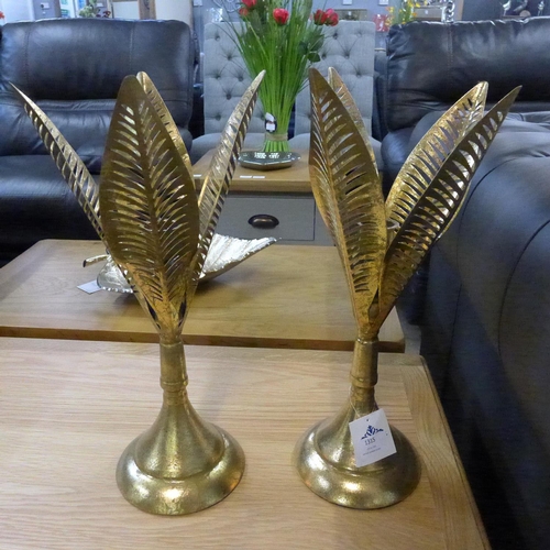 1315 - A pair of gilt leaf candle holders