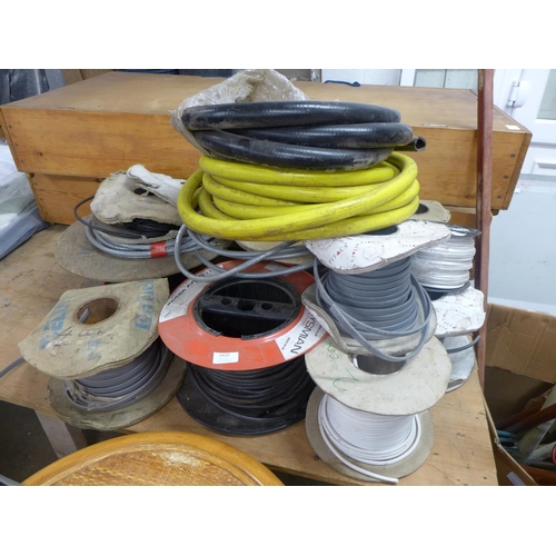 2429 - Quantity of rolls of wire and 2 small rolls of hose pipe