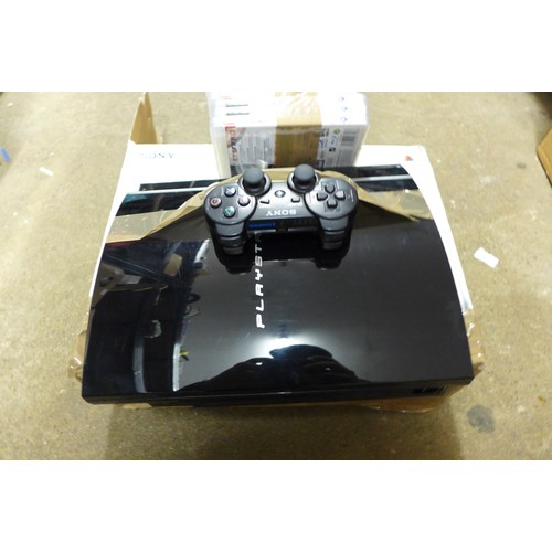 2129 - Playstation 3 with controller and games, no leads