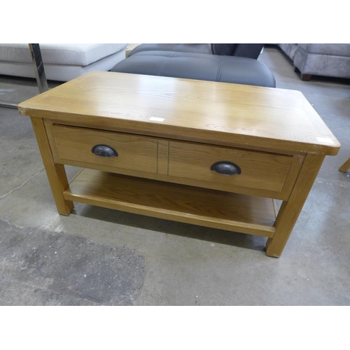 1580 - An oak single drawer coffee table * this lot is subject to VAT