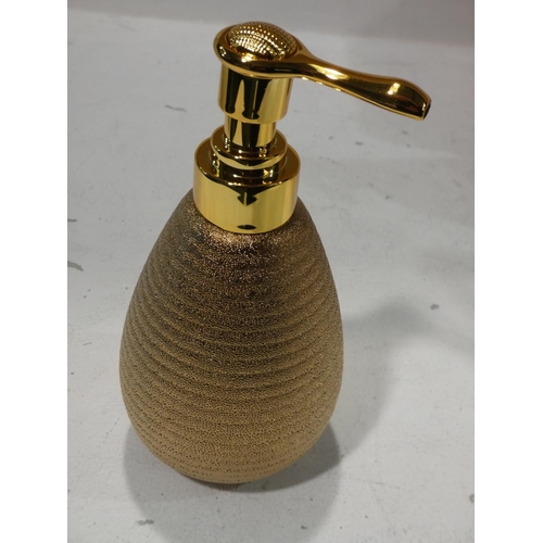 3050 - 4 Gold effect soap dispensers and basket * This lot is subject to VAT