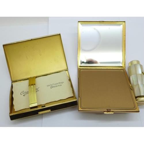 A Swiss square compact, a Melissa cigarette case and a Kigu 