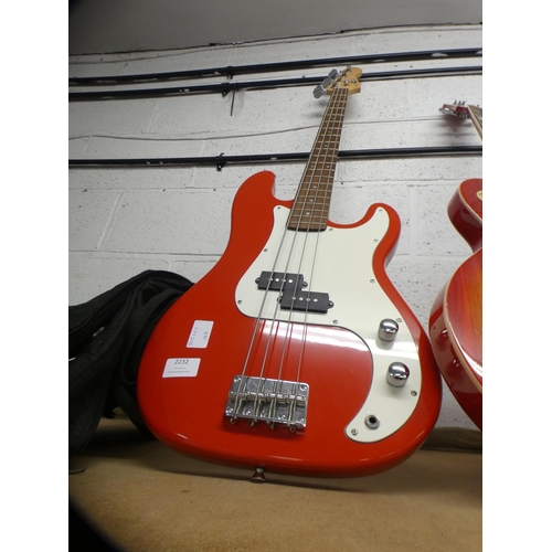 2232 - Red electric base guitar with case