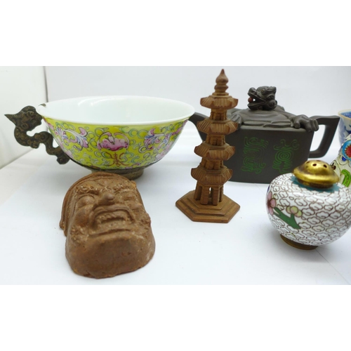 704 - Oriental items, a cloisonne salt and pepper pot, two cloisonne owls, tea bowls, a carving, teapot, m... 