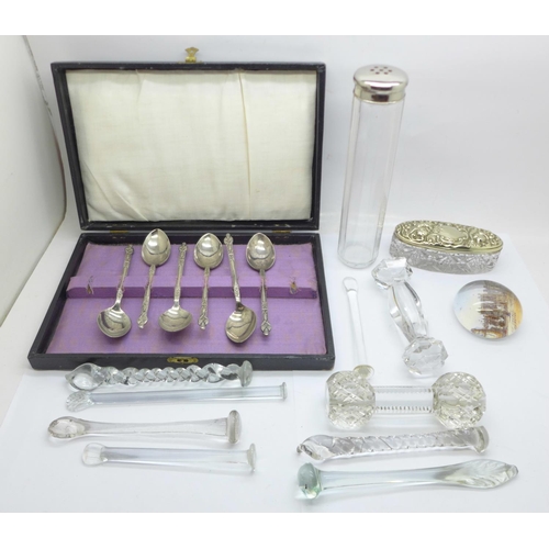 705 - Nine glass knife rests, a set of plated Apostle spoons and two glass dressing table containers with ... 