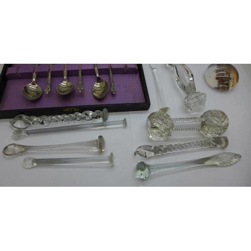 705 - Nine glass knife rests, a set of plated Apostle spoons and two glass dressing table containers with ... 