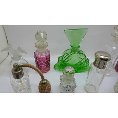 706 - Thirteen perfume bottles and atomisers