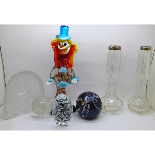 709 - A pair of silver rimmed glass vases, a glass clown and four paperweights