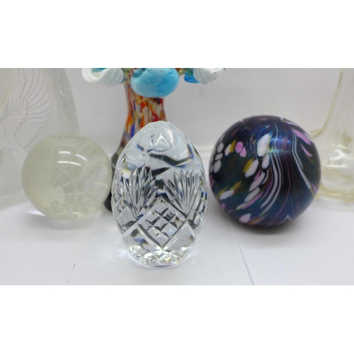 709 - A pair of silver rimmed glass vases, a glass clown and four paperweights