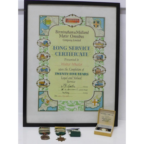 717 - Bus memorabilia; a framed Long Service certificate and two Safe Driving medallions and badge