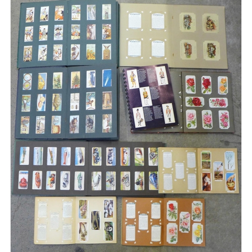 729 - Nine complete cigarette card albums with over 1000 original cigarette cards in total