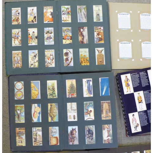 729 - Nine complete cigarette card albums with over 1000 original cigarette cards in total