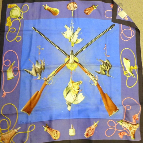 733 - A collection of seven Hermes scarves; one boxed and six others including 'Paris, London, 1850, Les B... 