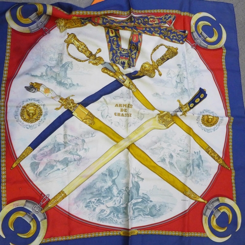 733 - A collection of seven Hermes scarves; one boxed and six others including 'Paris, London, 1850, Les B... 