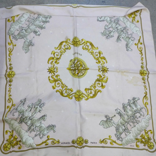 733 - A collection of seven Hermes scarves; one boxed and six others including 'Paris, London, 1850, Les B... 