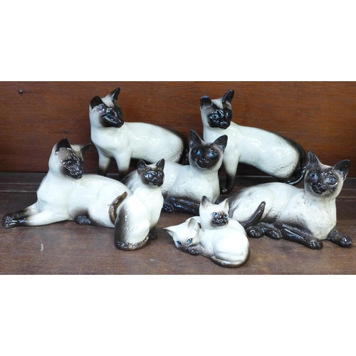 735 - Seven Beswick Siamese cats, two a/f, (chip on ears)