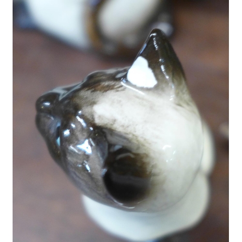 735 - Seven Beswick Siamese cats, two a/f, (chip on ears)