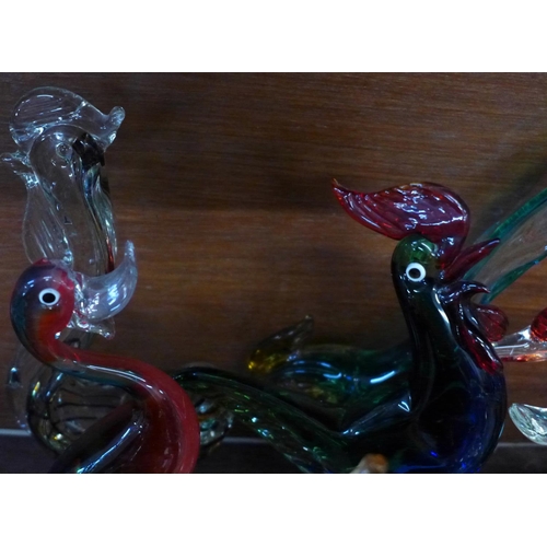 736 - Fourteen glass models; twelve birds and two dolphins, one bird a/f, chip on head