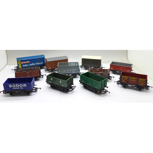 738 - Eleven OO gauge railway wagons including Hornby and Tri-ang