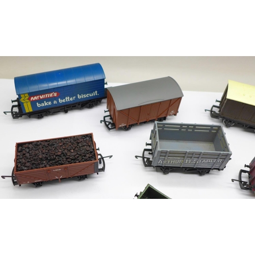 738 - Eleven OO gauge railway wagons including Hornby and Tri-ang