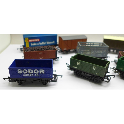 738 - Eleven OO gauge railway wagons including Hornby and Tri-ang