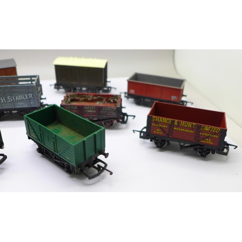 738 - Eleven OO gauge railway wagons including Hornby and Tri-ang