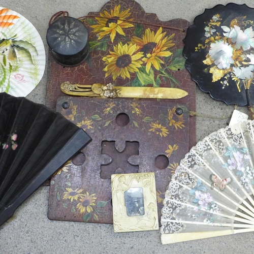 747 - A papier-mache lacquered hand fan inlaid with mother of pearl, three fans, circular box, Art Nouveau... 