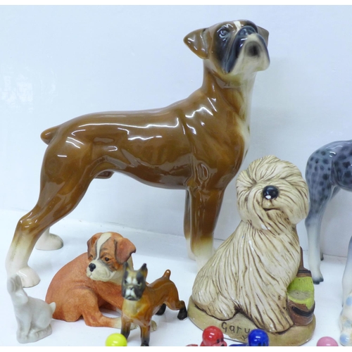 750 - A West German model of a giraffe, a small Szeiler giraffe, boxer dogs, Wade Whimsies and similar com... 