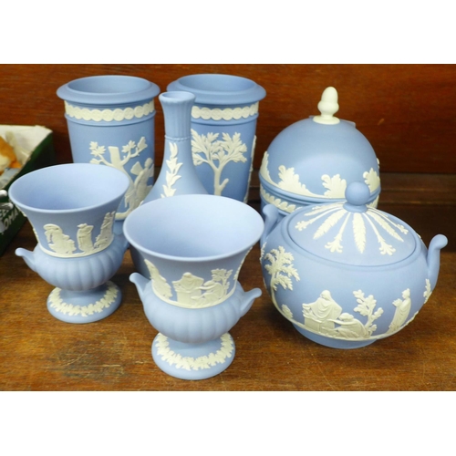 752 - Seven items of Wedgwood Jasperware, two lidded pots, two Campana urns, two cylindrical vases and one... 