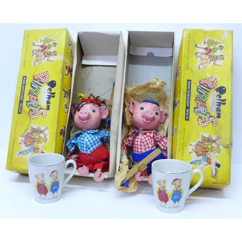 757 - Pelham Puppets; Pinky and Perky, both boxed and two 1960's mugs