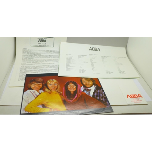 764 - An ABBA fan club folder with fact sheets and two posters