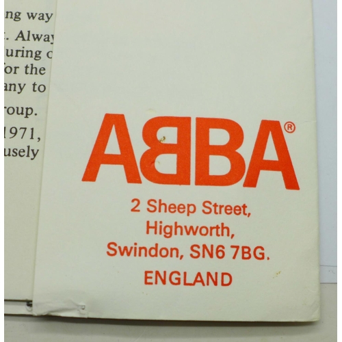 764 - An ABBA fan club folder with fact sheets and two posters