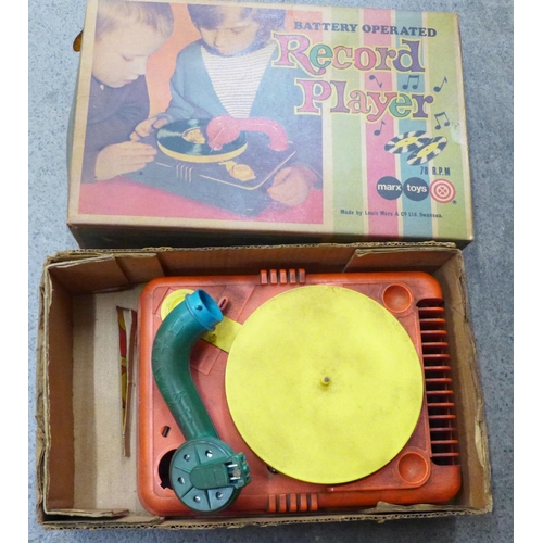 775 - A child's battery operated record player, boxed