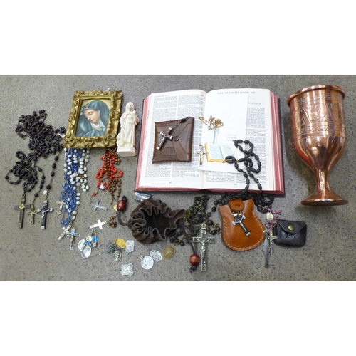 784 - A collection of religious items including twelve rosarys, agate, mother of pearl, blue crystal, four... 