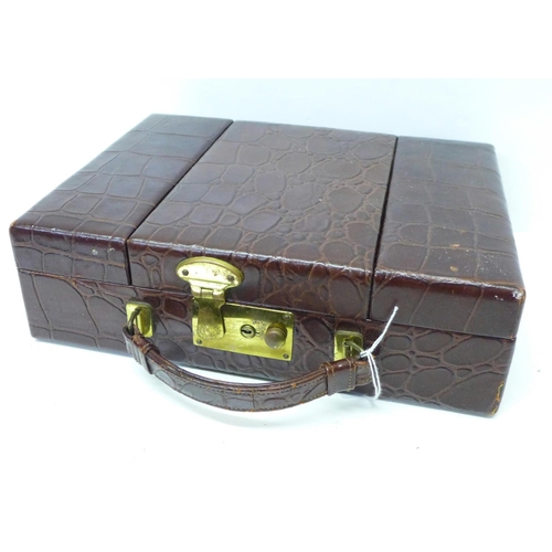 787 - A vintage crocodile jewellery box