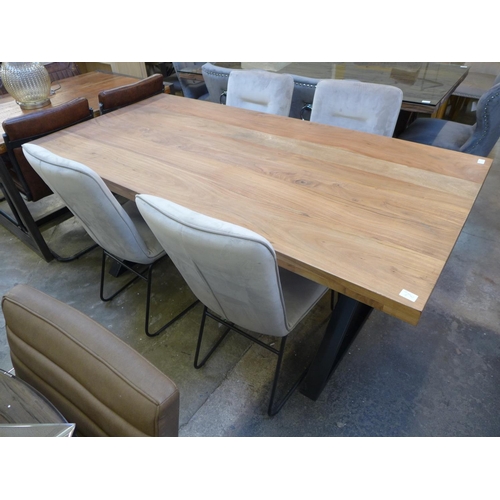 1458 - A hardwood and steel dining table and four Stella chairs