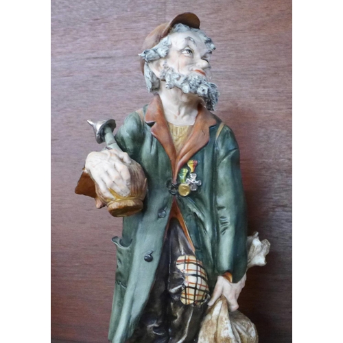 1278D - A Capodimonte figure of a gentleman with fish, a/f, (missing two toes on one foot) and one other con... 