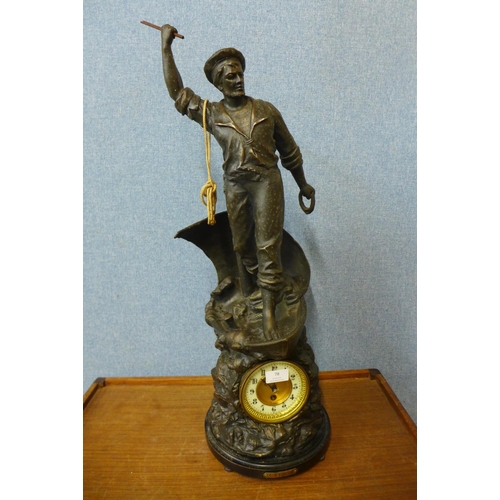 41 - A large 19th Century spelter figural  mantel clock, titled  Cod Fishing, 75cms h