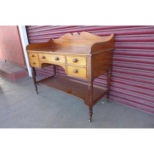 107 - A George IV mahogany five drawer writing desk, attributed to Gillows of Lancaster, 98cms h, 122cms w... 