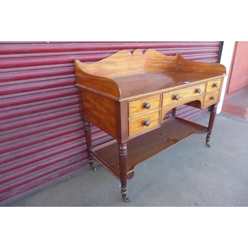 107 - A George IV mahogany five drawer writing desk, attributed to Gillows of Lancaster, 98cms h, 122cms w... 